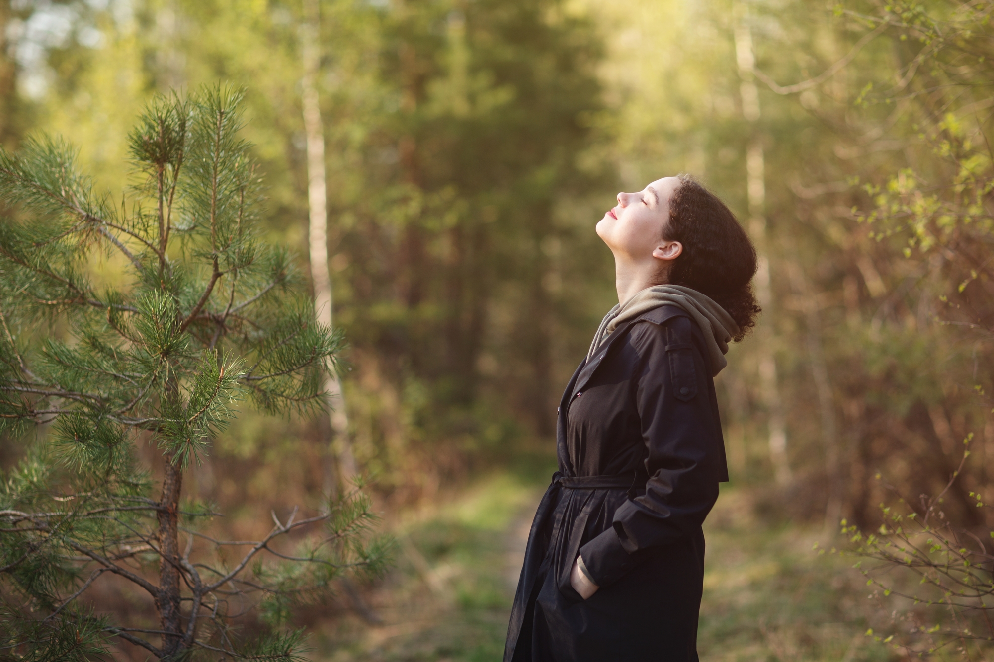A girl breathing in a forest